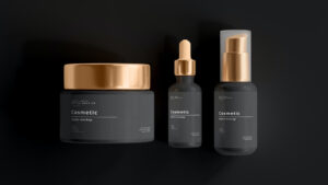 two bottles of cosmetic products on a black background